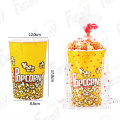 Belle tasse de pop-corn en papier jetable